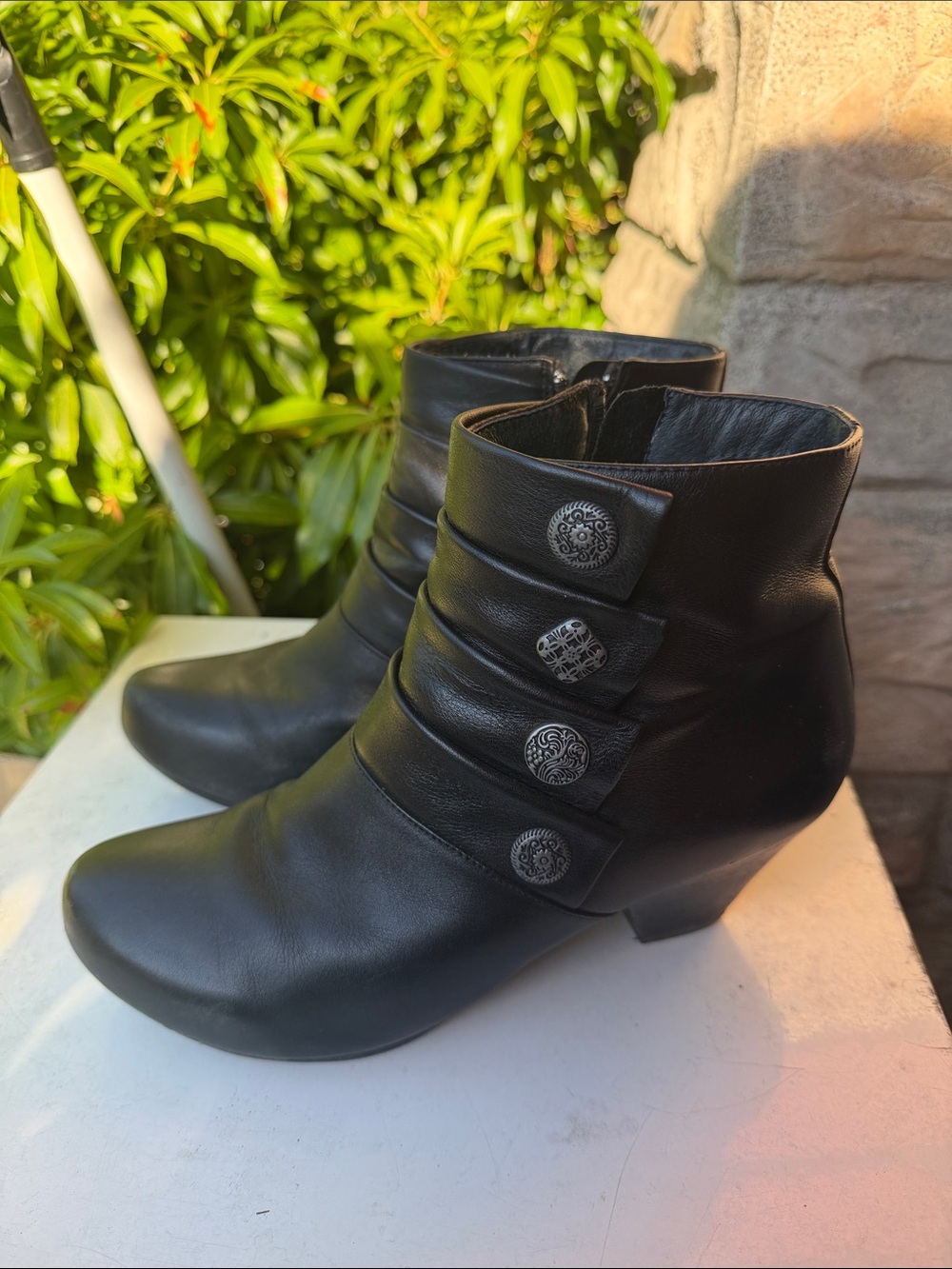 Dansko Black Leather Ankle Boots with Decorative Button Straps